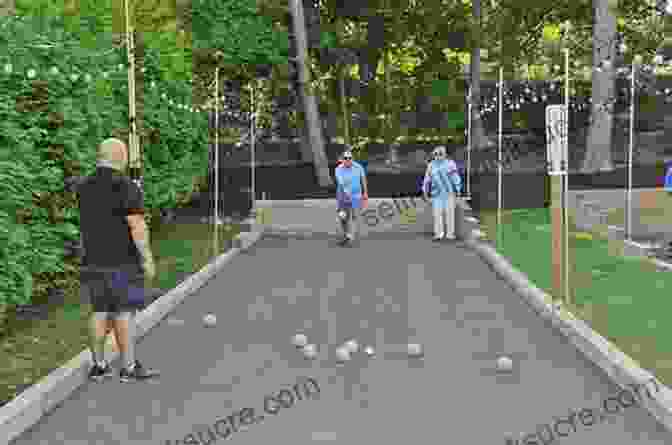 Image Of A Bocce Ball Game In Progress With Players Rolling Balls Towards The Target Tag Toss Run: 40 Classic Lawn Games
