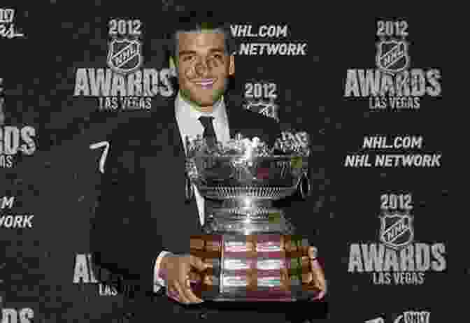 Patrice Bergeron Holding The Selke Trophy Boston Bruins: Greatest Moments And Players